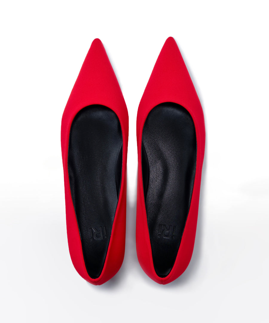 Pair of iRi red pointed-toe shoes on a white background